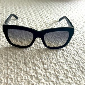 Tory Burch sunglasses.  New without tags.  Comes with dust bag and glass case.